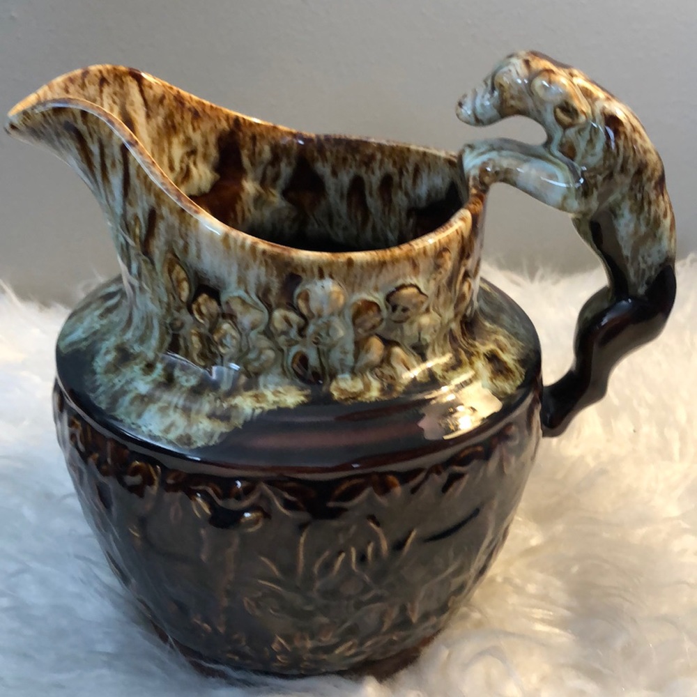 Reproduction Harber Rockingham pitcher with dog